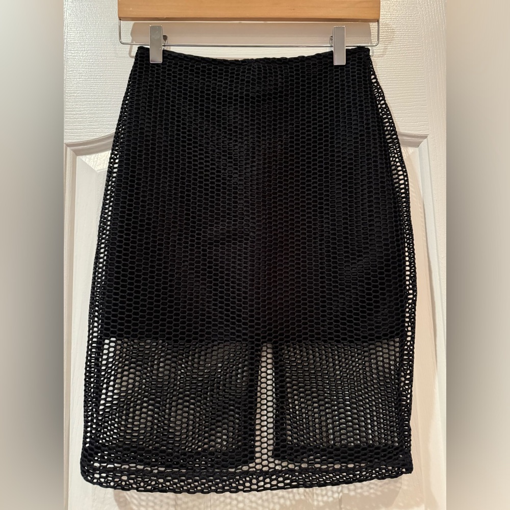 Mika & Gala women’s black netted mini skirt. Size small. Brand new!